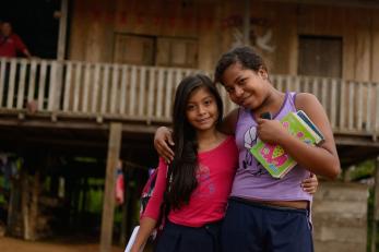 Violence is a daily risk for children like Lucia* (right) and Elena*, who attend a rural boarding school in Colombia. Mercy Corps is working to make these schools safer by ensuring students receive the full-time care they need to stay protected and healthy. All photos: Miguel Samper for Mercy Corps