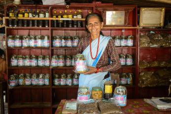 Women aren't often involved in business in rural Nepal, but 59-year-old Harikala is the strong leader of her family's bustling pickle shop.