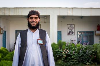 Ahmad mohammad is pictured outside of the training center where he took mercy corps' mobile phone repair course.