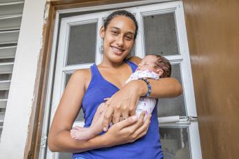 Puerto rican woman with her newborn