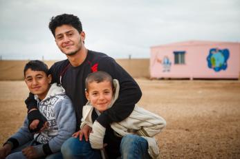 Sami is a volunteer at one of Mercy Corps' child-friendly spaces in Zaatari camp. His work has given him a new sense of purpose, and he's now sharing that with others. Photo: Sumaya Agha for Mercy Corps