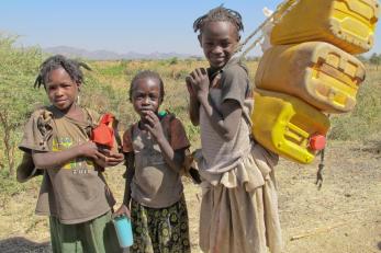 From a young age, girls in Ethiopia are expected to gather wood, fetch water and shop for the family’s food. It can take all day to collect enough food and water for one meal, so there is often no time for school. Photo: Joni Kabana for Mercy Corps