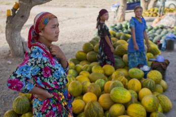 women standing around their produce
