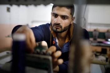 Photos 1 and 2, Bashar in 2015, working at a small textile factory in northern Jordan. Photos 3 and 4, Bashar in 2018, still working 70-hour weeks at the factory. PHOTOS: Peter Biro and Annie Sakkab for Mercy Corps