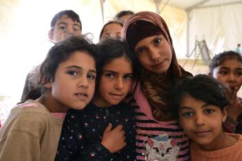 Shahed, 10, (in blue) survived the bombing of Dara’a, her hometown. I instantly sense her strength, and know she’ll be O.K. Still, I am glad when she dashes off. It’s Friday and her mom has a special chicken dinner waiting, like Sunday dinner in the U.S. Rituals in camp help keep families together, and Shahed will need hers.