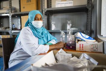 Amna is a midwife at the Um Rakuba camp’s health centre pharmacy.