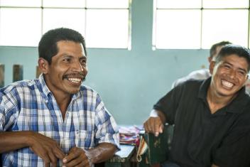 Through support from The Starbucks Foundation, Santos (left), a leader in the Rocja Chuachil community in Guatemala, promotes the use of public latrines and trash cans as well as a community emergency fund in coordination with the Health Commission.